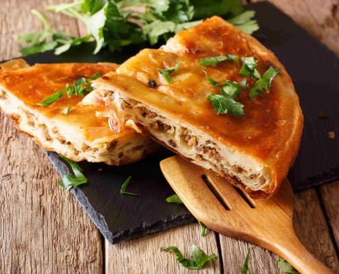 Delicious-appetizer-Balkan-burek-with-minced-meat-close-up-min